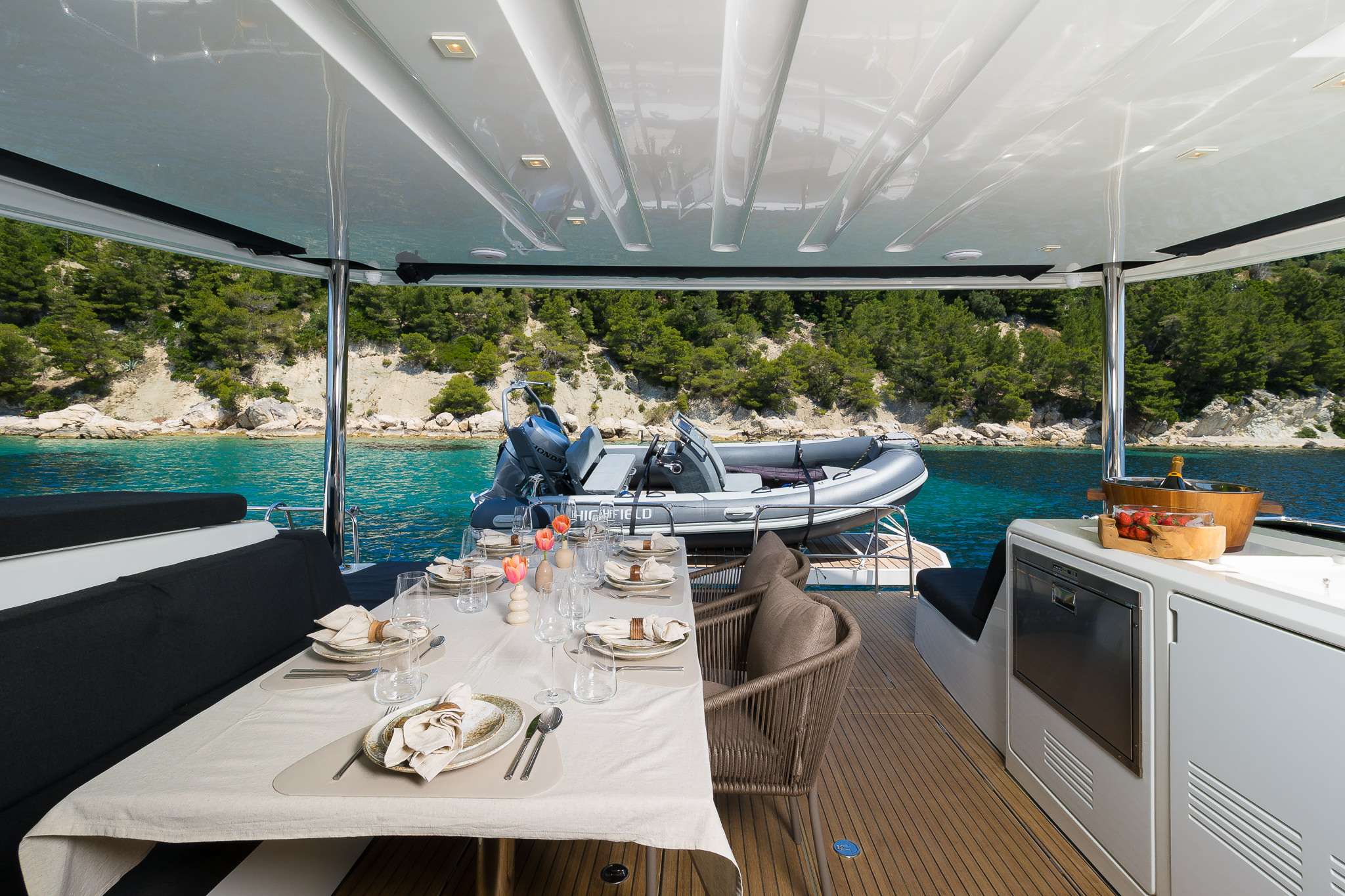 CHAMPAGNE PLEASE Lagoon 55 - main aft deck alfresco dining set up