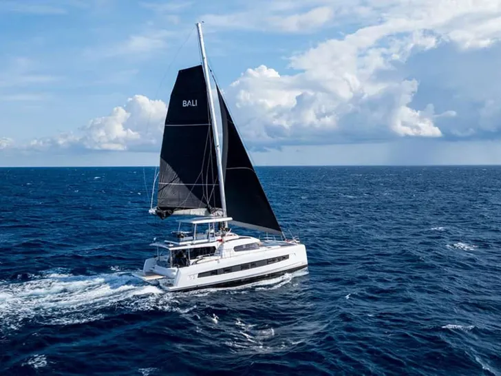 NO RUSH Bali 5.2 - cruising across the Caribbean water NO RUSH Bali 5.2 - cruising across the Caribbean water