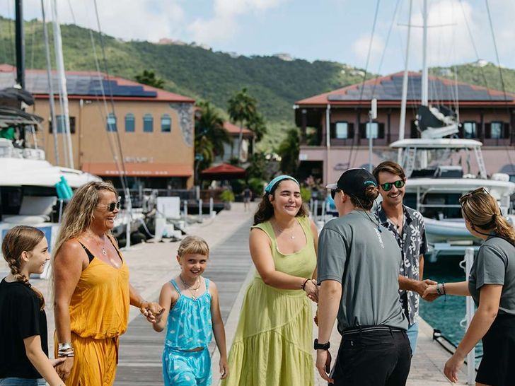 AQUANIMITY Dufour 48 - guests being welcomed aboard AQUANIMITY Dufour 48 - guests being welcomed aboard