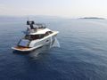 IT`S MAGIC Monte Carlo MCY65 - anchored aft aerial shot IT`S MAGIC Monte Carlo MCY65 - anchored aft aerial shot