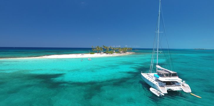 Crewed Catamaran Charter Yacht Anchored in the Bahamas