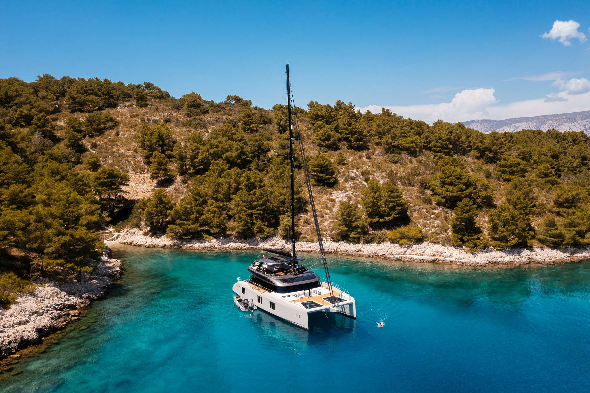Crewed Catamaran anchored in Lastovo