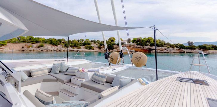 Crewed Catamaran in Sheltered Bay in Ibiza