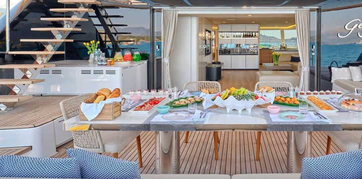Breakfast onboard Crewed Catamaran Charter Yacht
