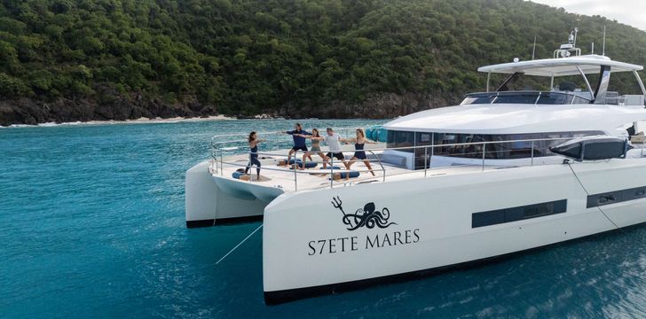 Morning Yoga on board crewed power catamaran SIETE MARES