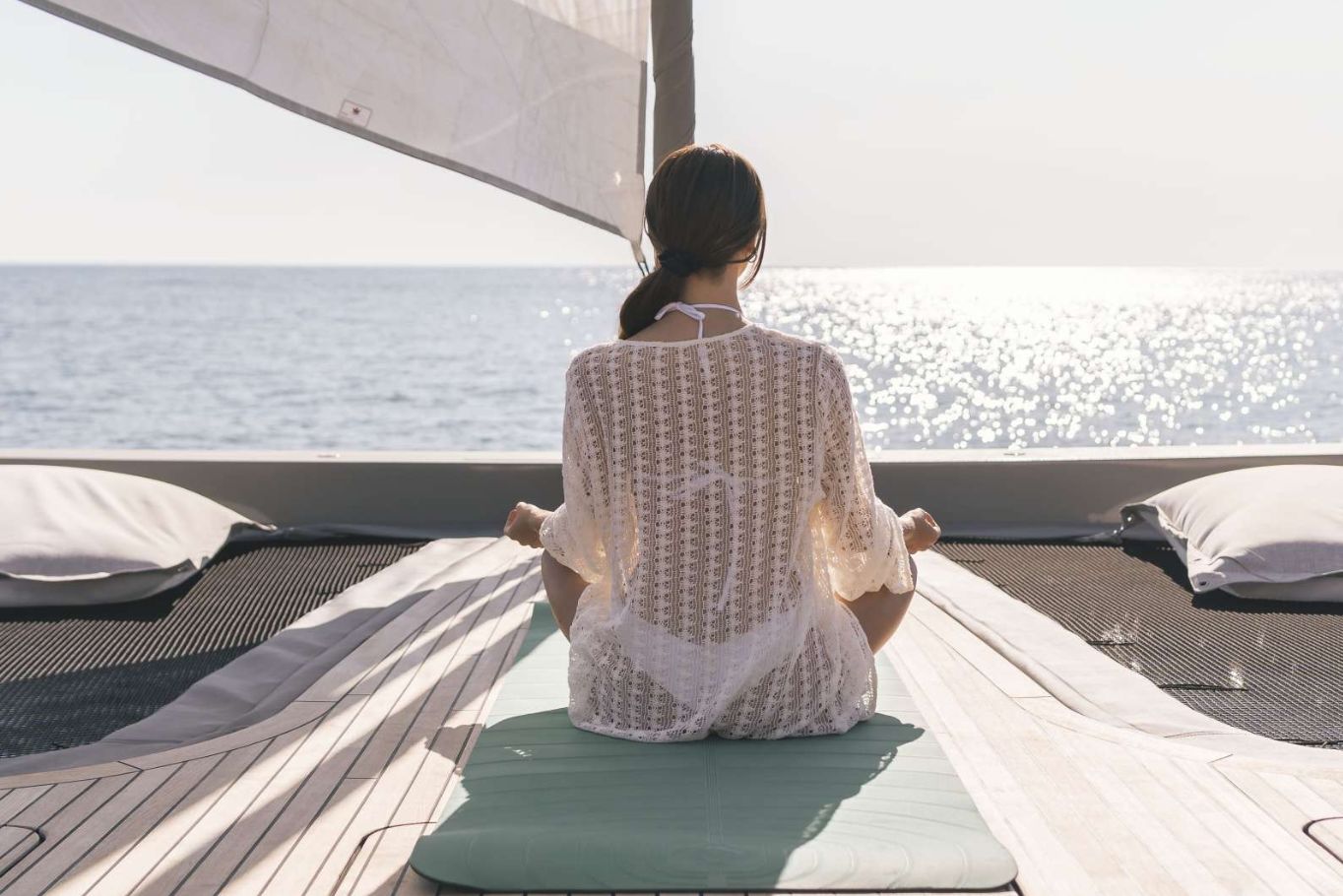 Morning Yoga on Board a Luxury Crewed Catamaran