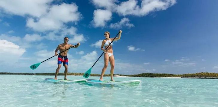 Paddleboarding on a luxury crewed yacht charter in the BVI