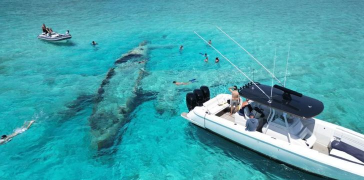Snorkeling at the Sunken Smuggler's Plane Wreck