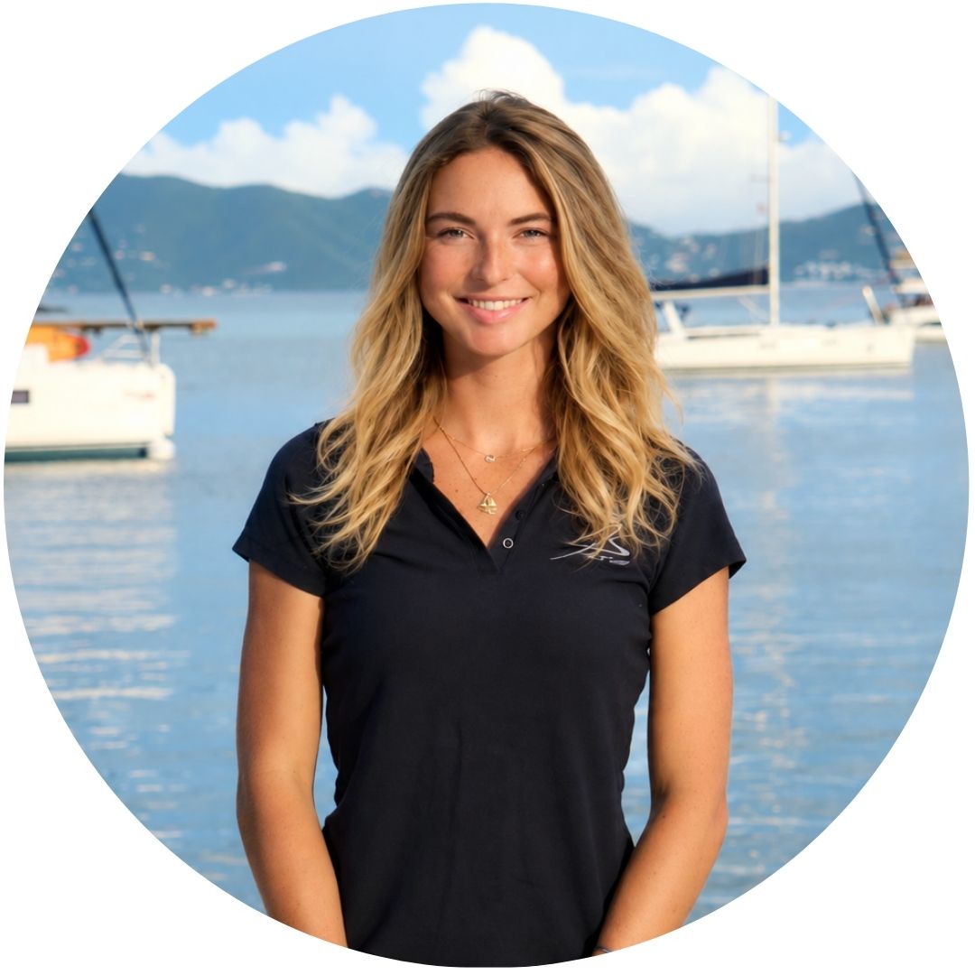 hannah westerman display photo in the boatbookings about us page with catamarans in the background