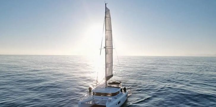 the bareboat catamaran seaduction cruising on the Amalfi Coast under the sun