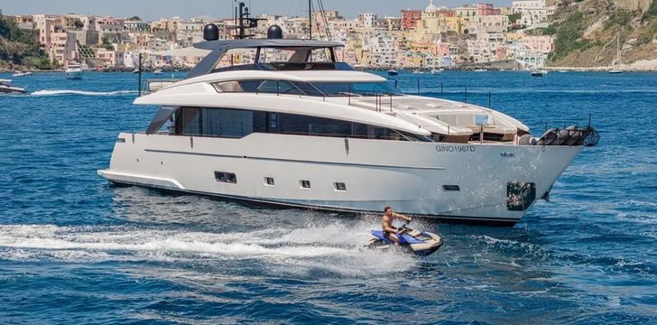 luxury crewed motor yacht catch me crusing across the amalfi coast blue water