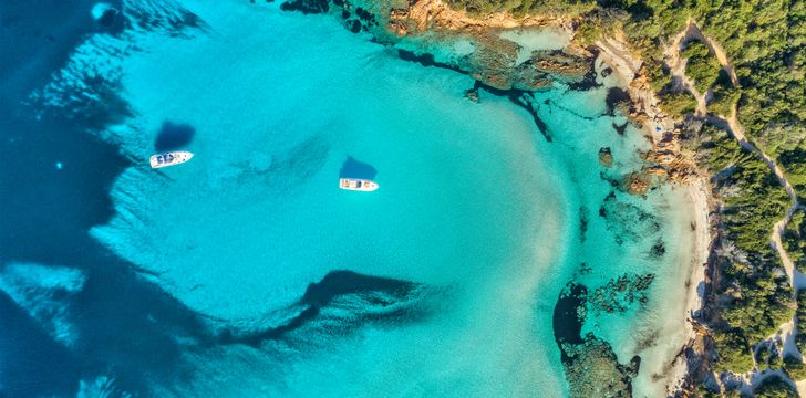 top aerial shot of sardinia's turquoise crystal clear waters